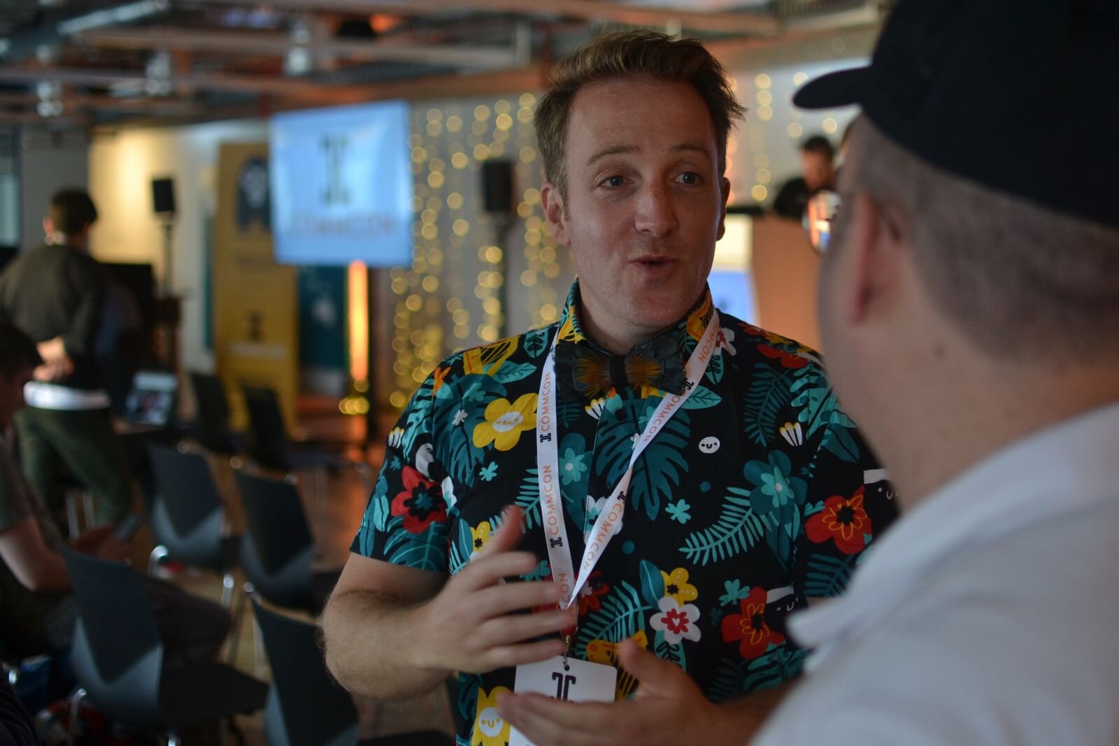 Evan McGee chatting between talks.