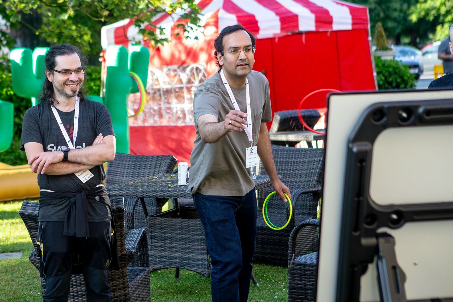 Tomfoolery at CommCon 2023: Attendees play a game of ringtoss in the grounds of CommCon 2023's venue